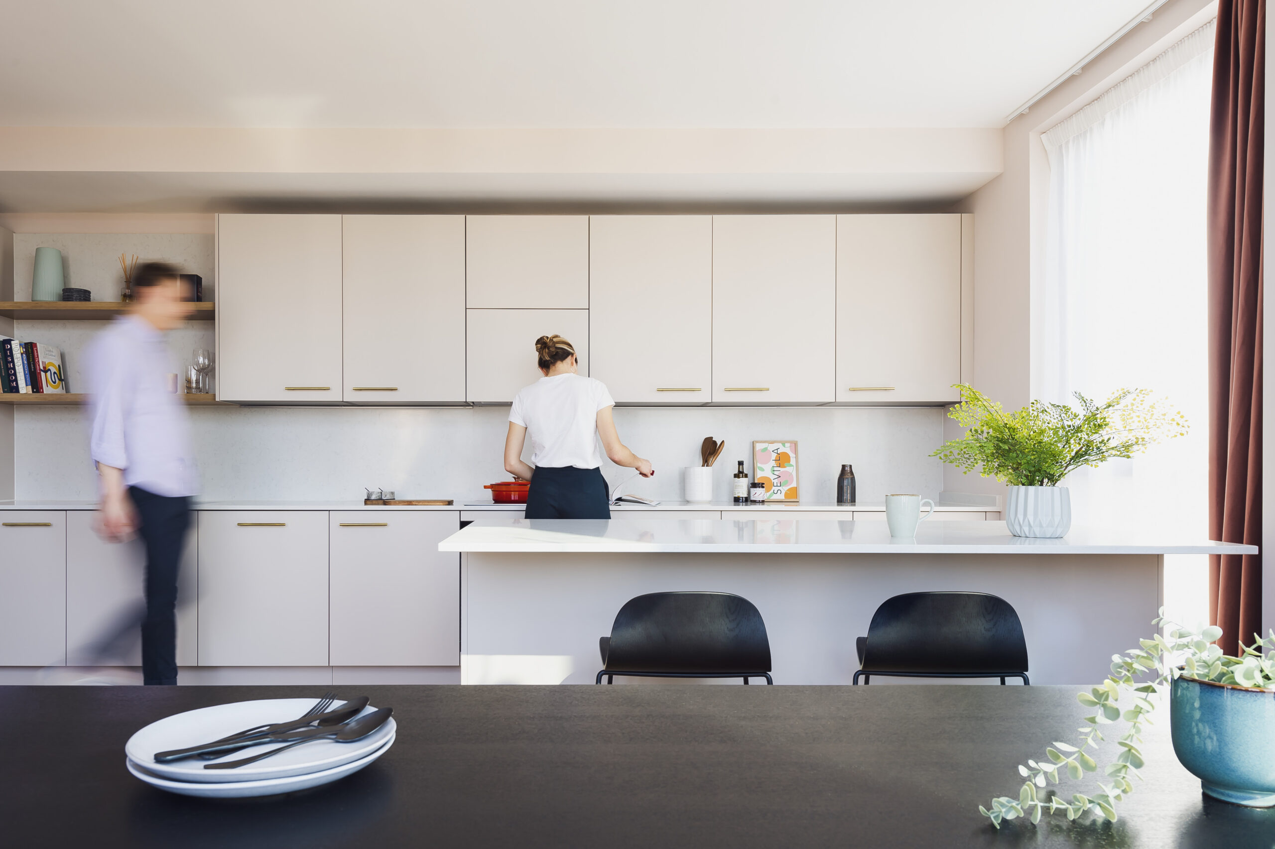 People inside a kitchen at Portlands Place, East Village