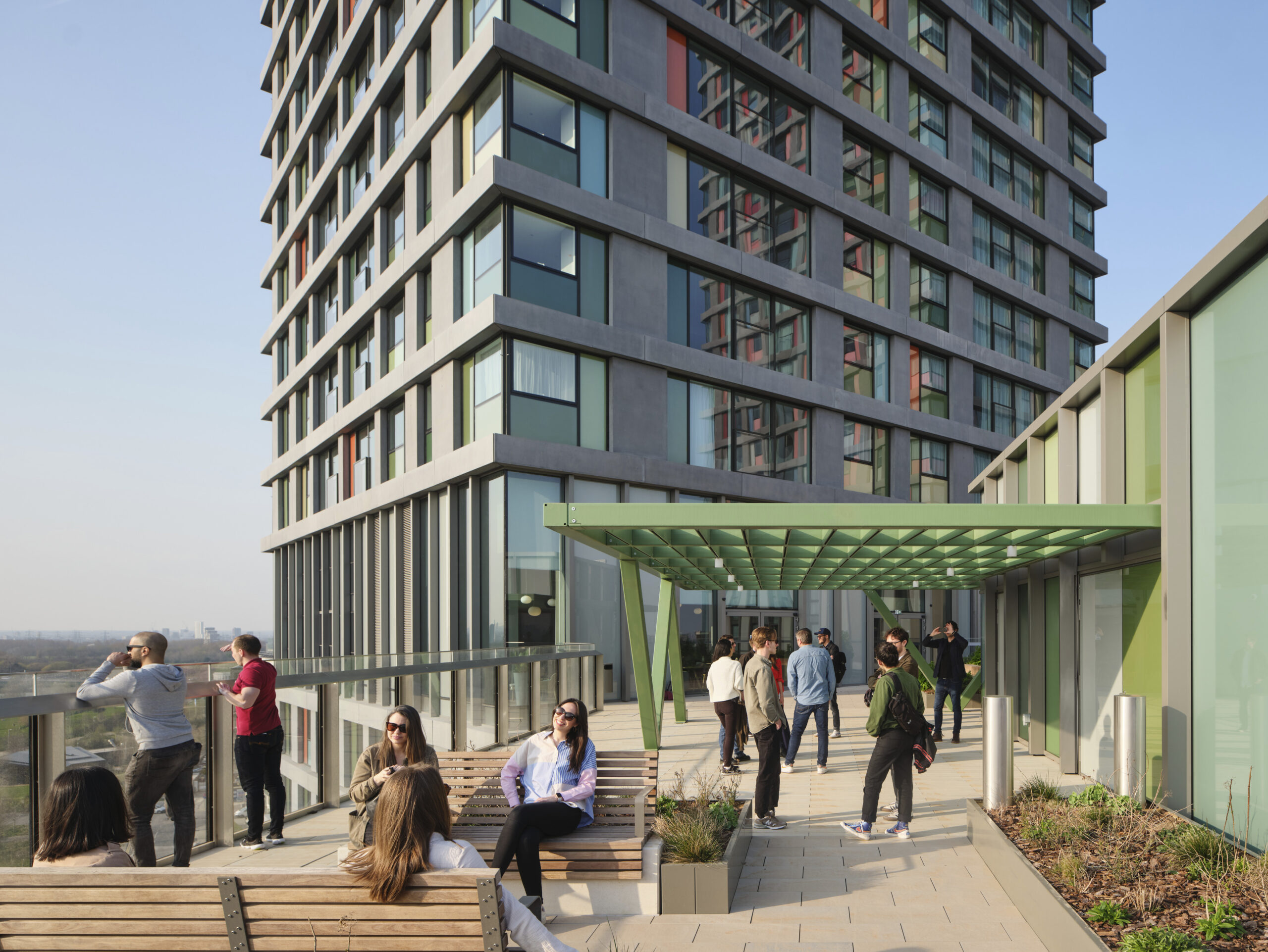 People hanging out on the rooftop at Portlands Place, East Village