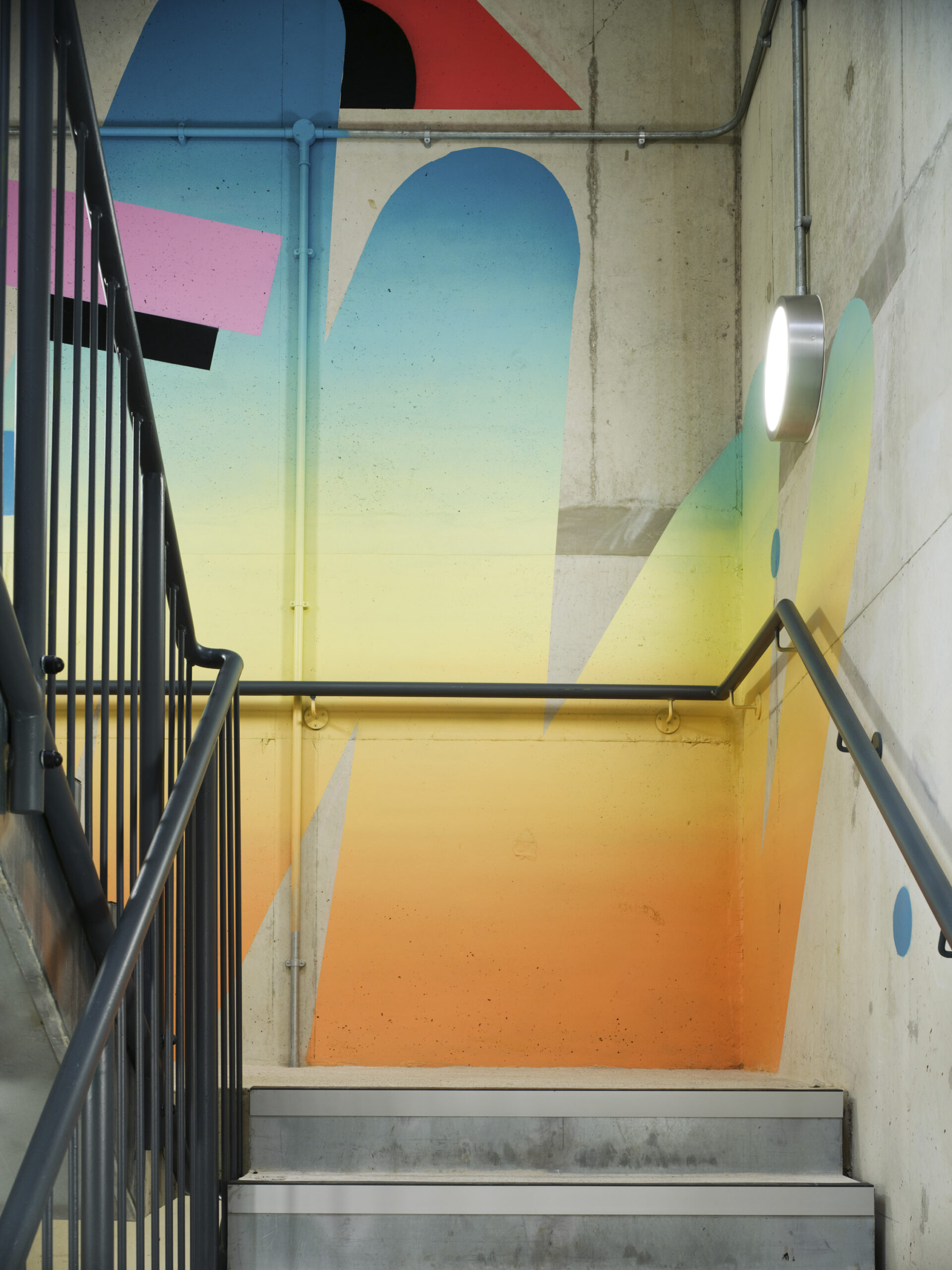 Staircase with colourful interior design