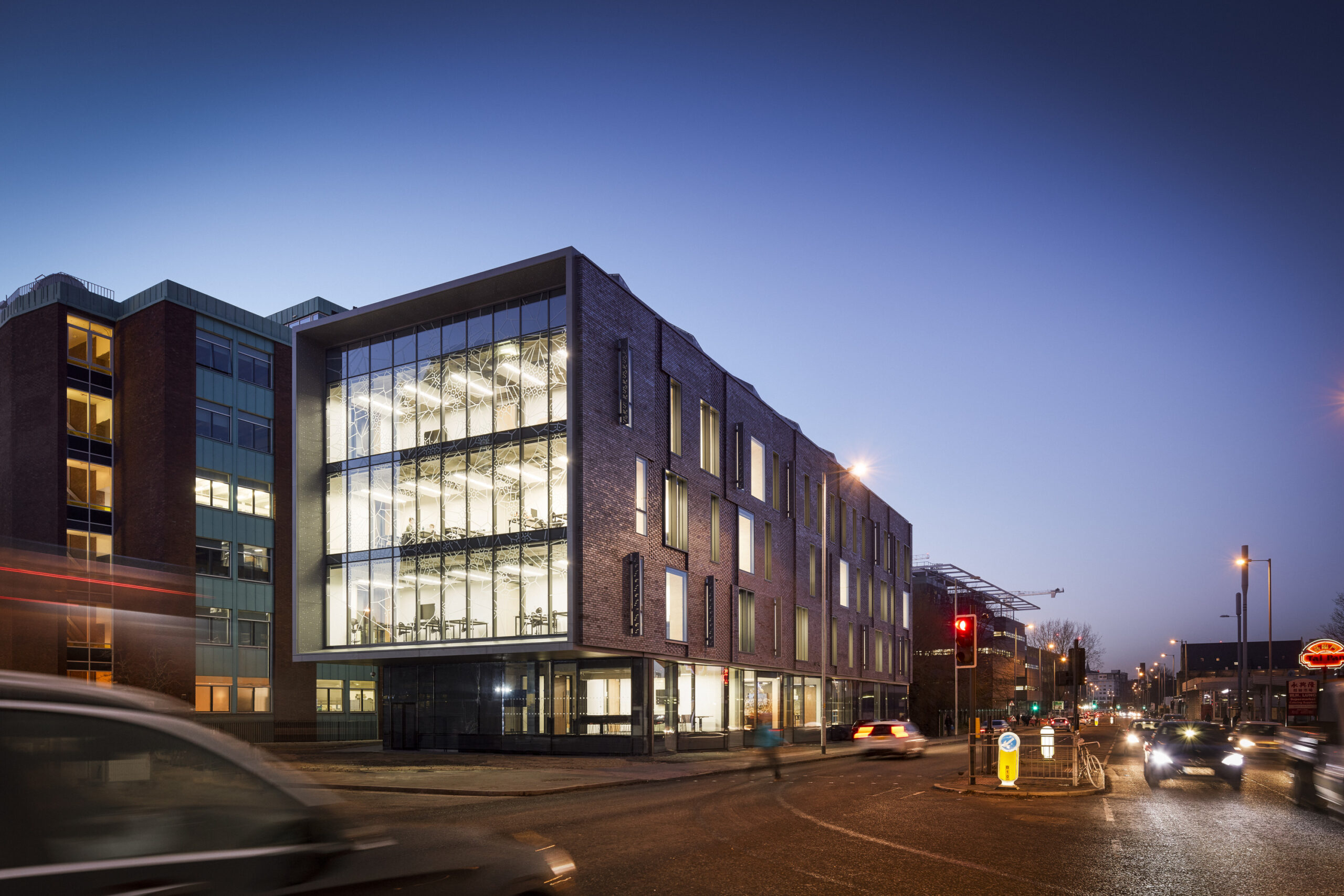 Hawkins Brown-University of Manchester Schuster Annexe-external façade dusk shot