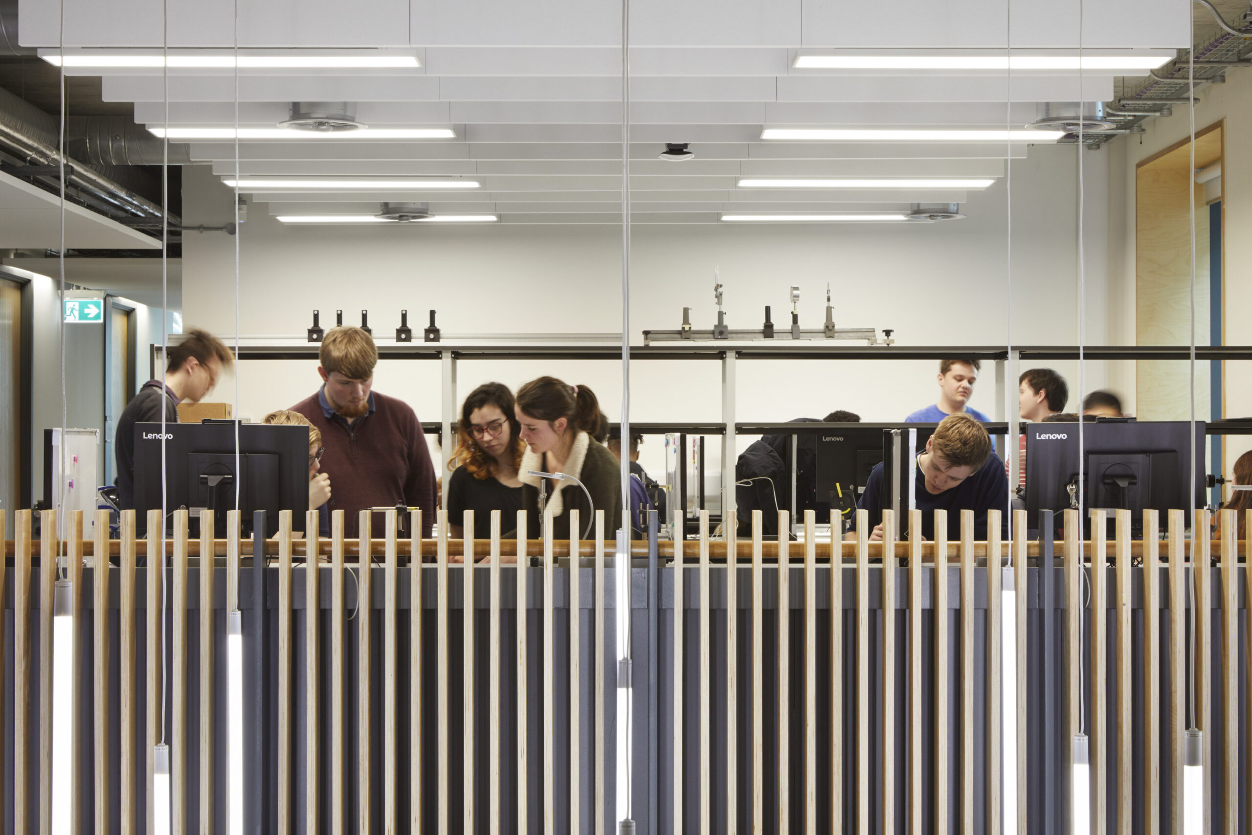 Students collaborating in a lab at University of Manchester Schuster Annexe