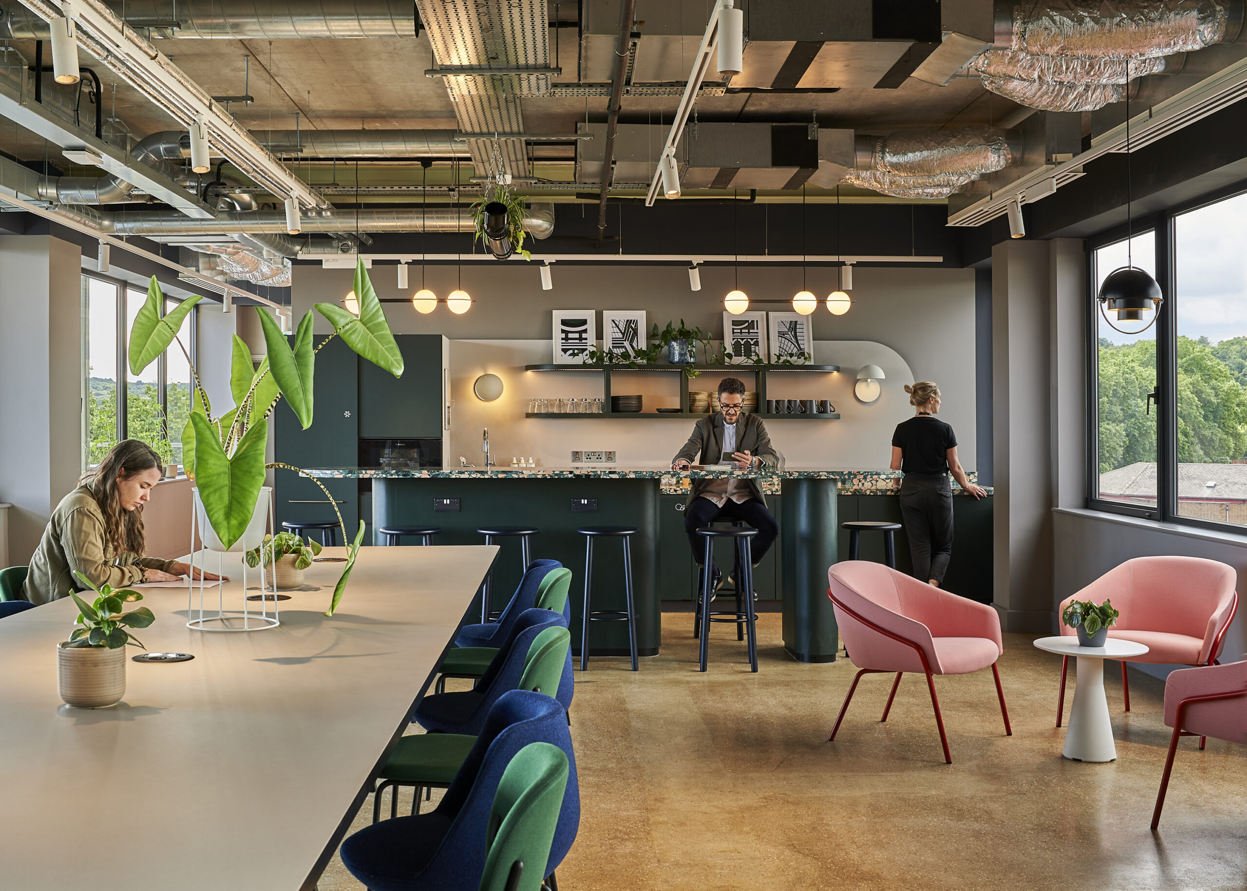 People sat inside the kitchenette at Greenside House