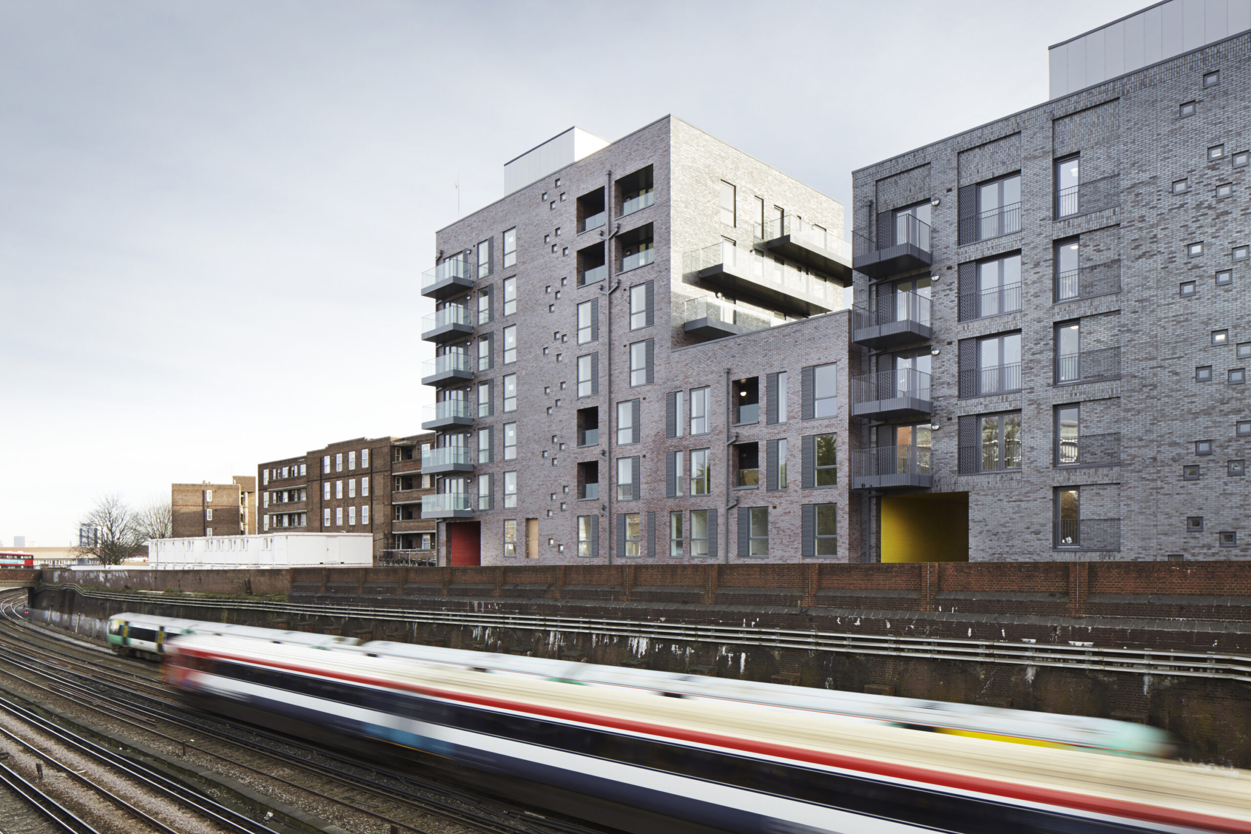 Hawkins Brown - Burridge Gardens - Industrial context, view from the railway