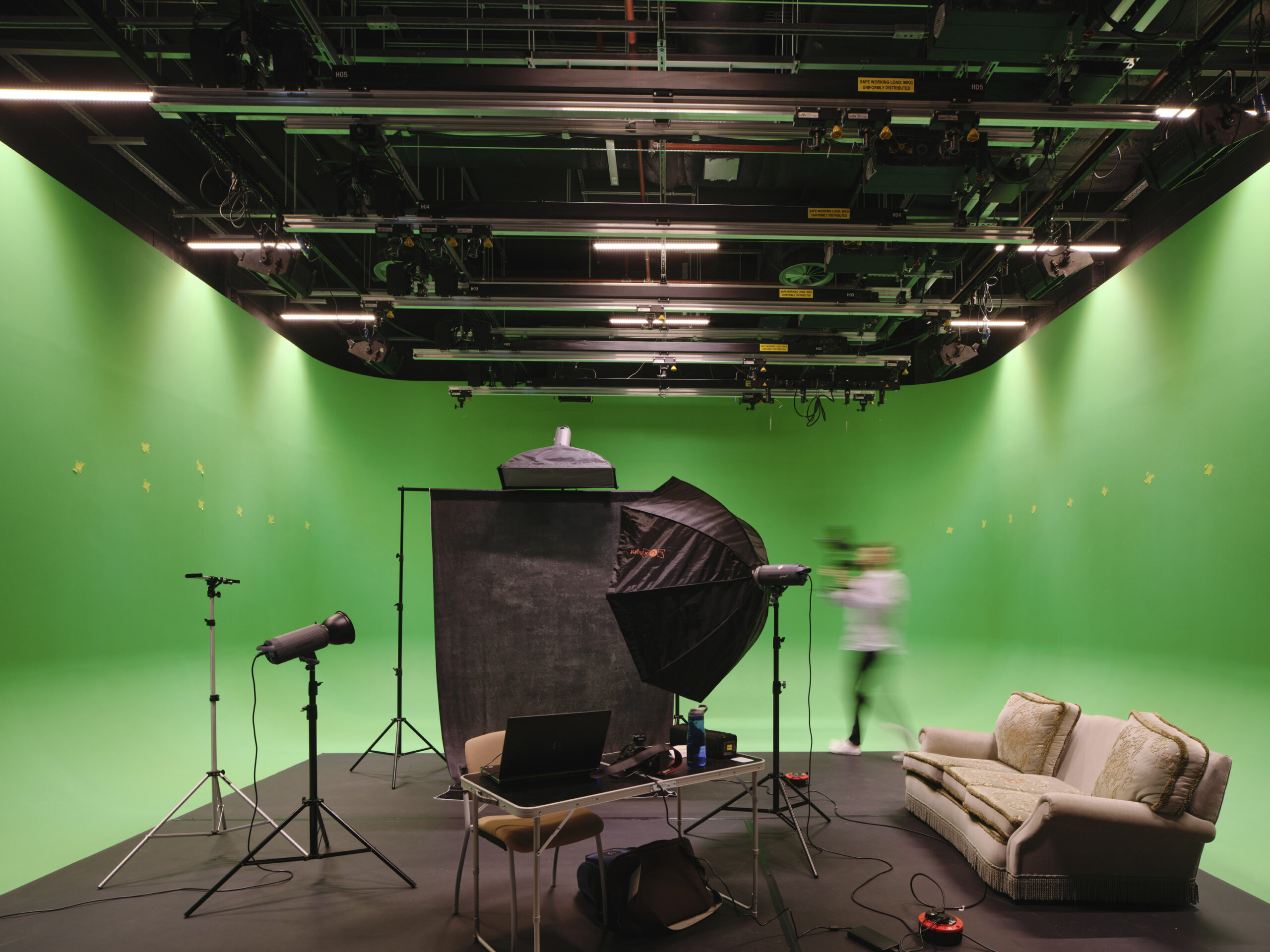 Man working in a green-screen studio at Leeds Beckett University School of Art