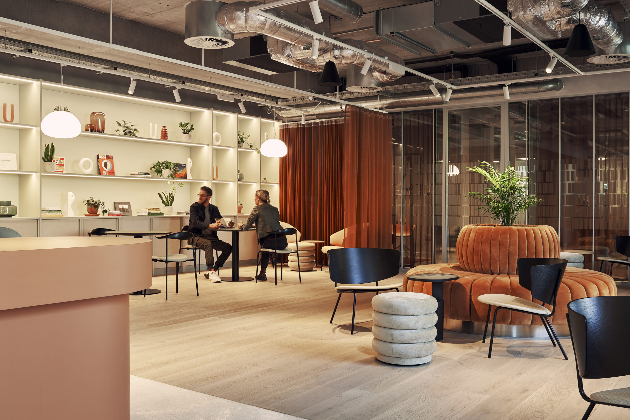 People socialising in the social café space at Mountbatten House Southampton