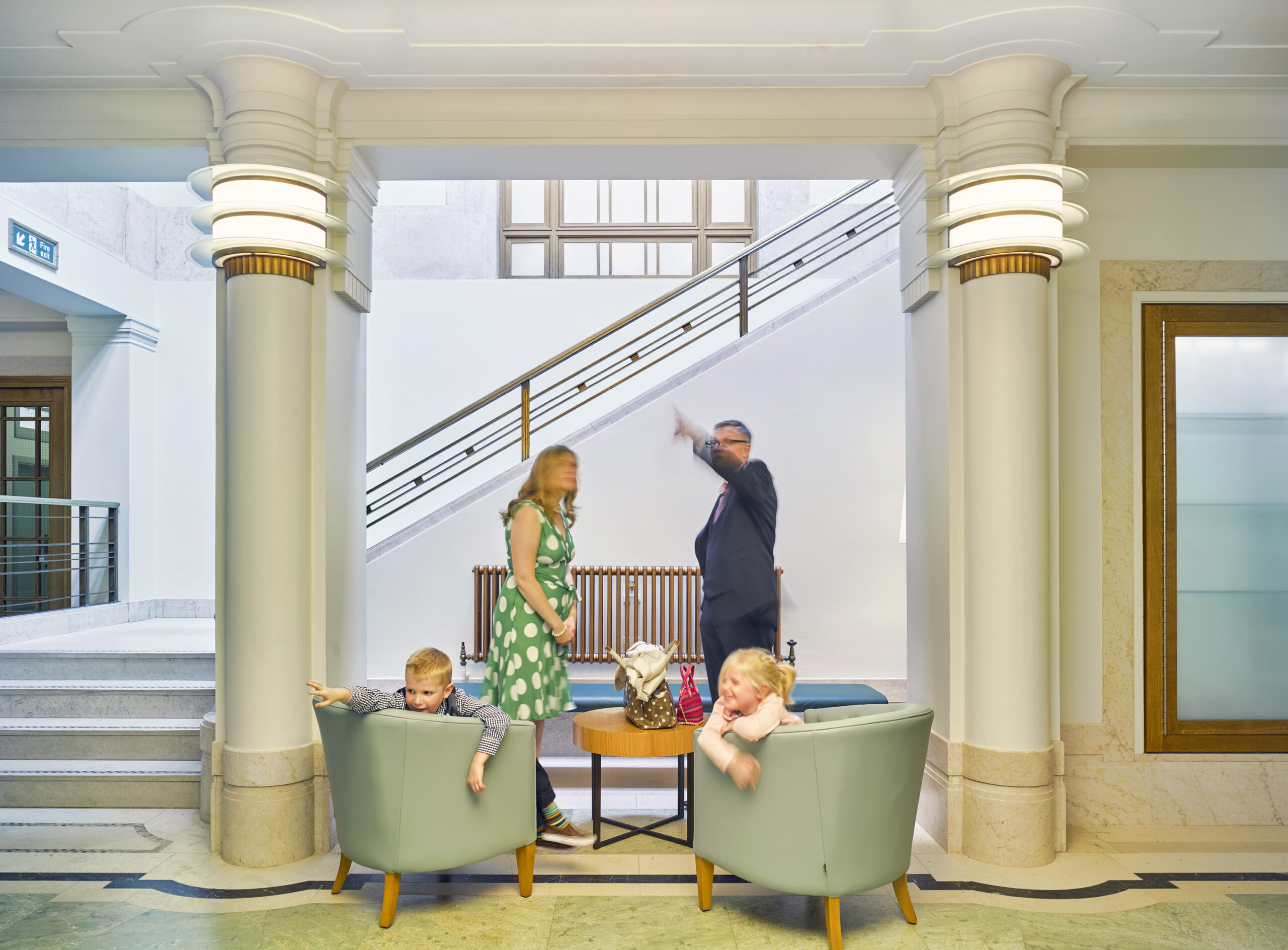 Family waiting in the corridor at Hackney Town Hall