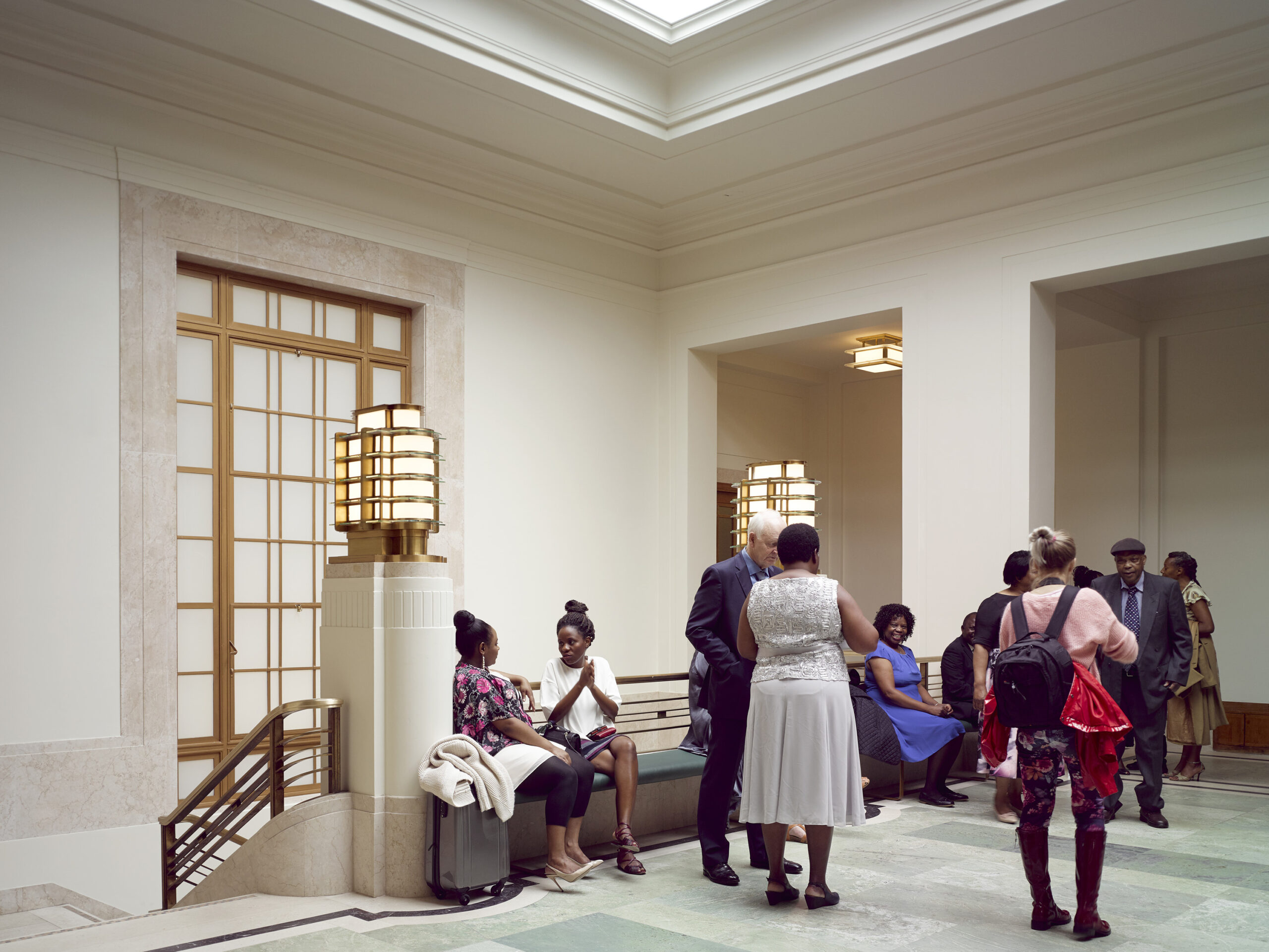 Interior shot of people waiting outside the wedding suites at Hackney Town Hall