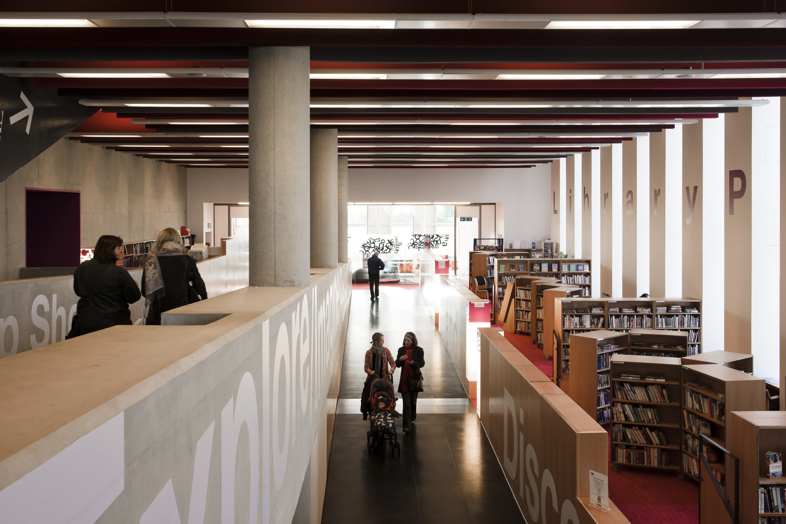 People walking around the library at Corby Cube