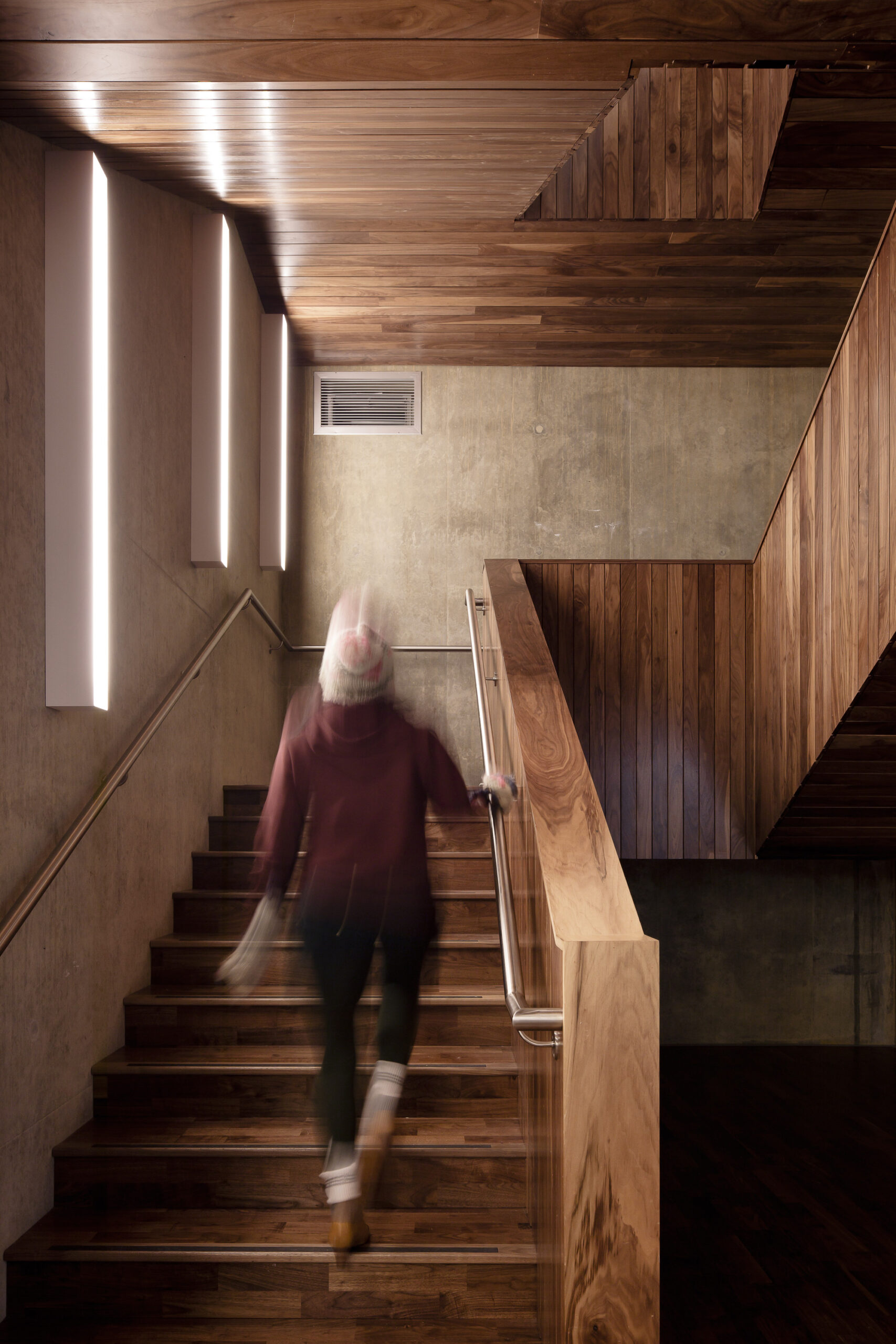 A person walking up the stair at Corby Cube